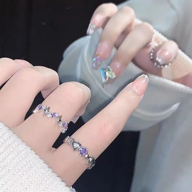Amethyst Heart Ring — Silver-tone open ring with a violet heart-cut stone, worn on the hand