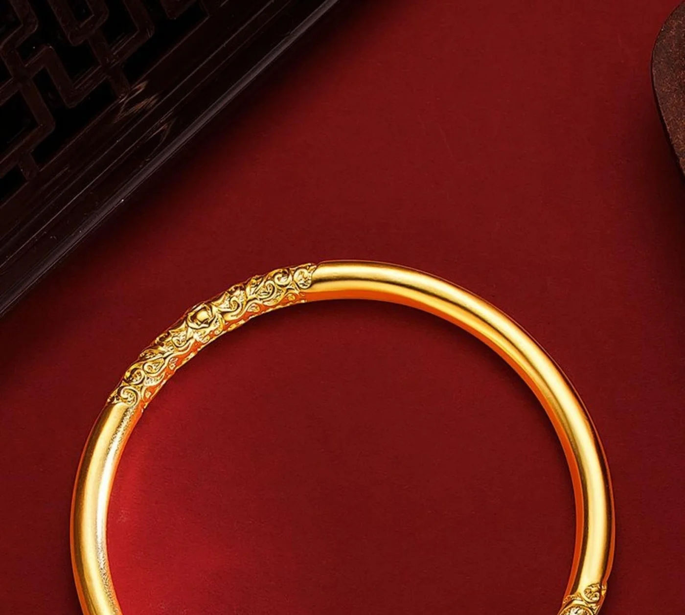 Engraved Gold-Tone Bangle — Gold-tone bangle bracelet with an engraved scrolling vine panel