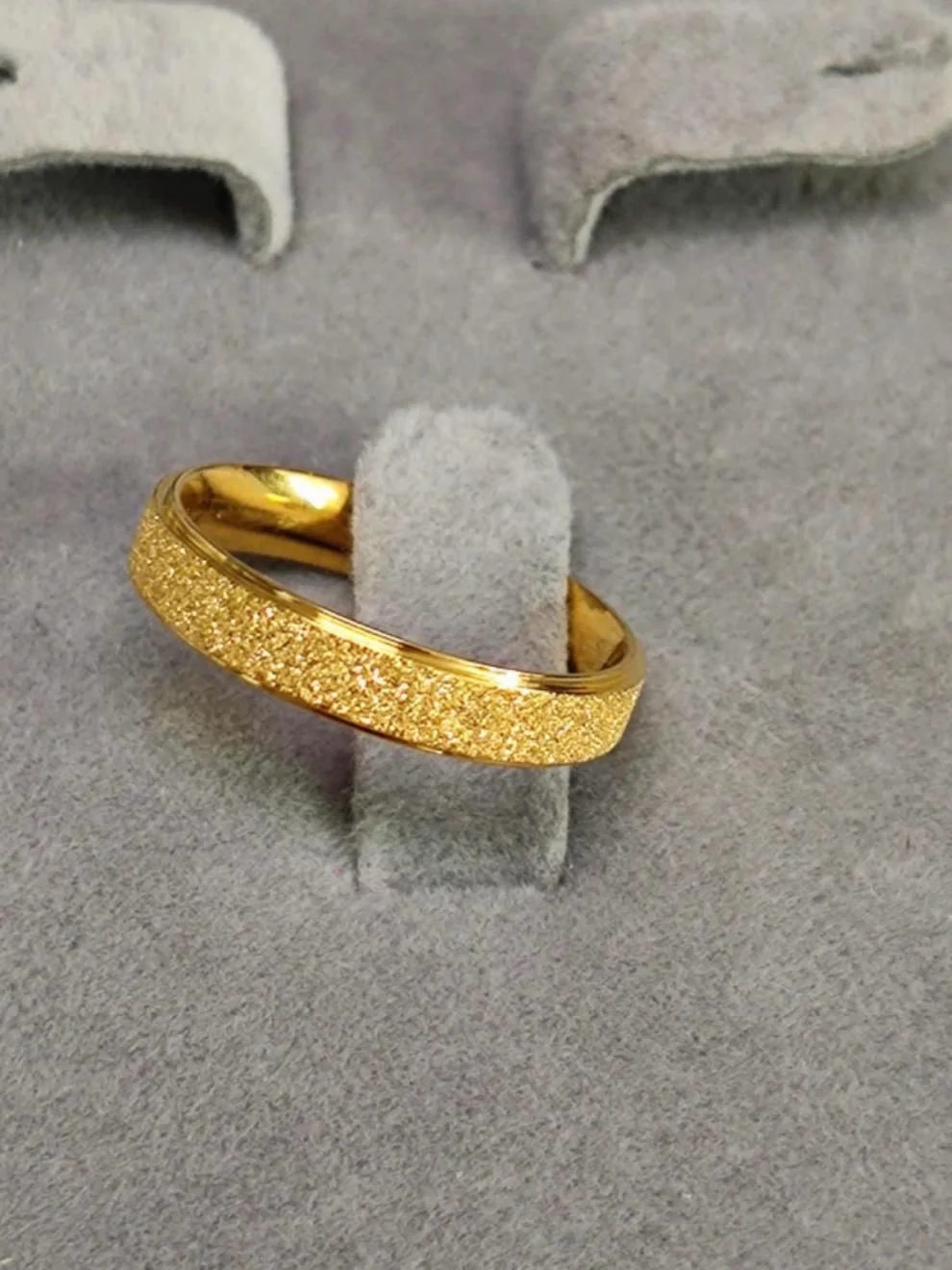 Titanium Star-Dust Band — Gold-tone titanium steel band ring with a frosted star-dust finish